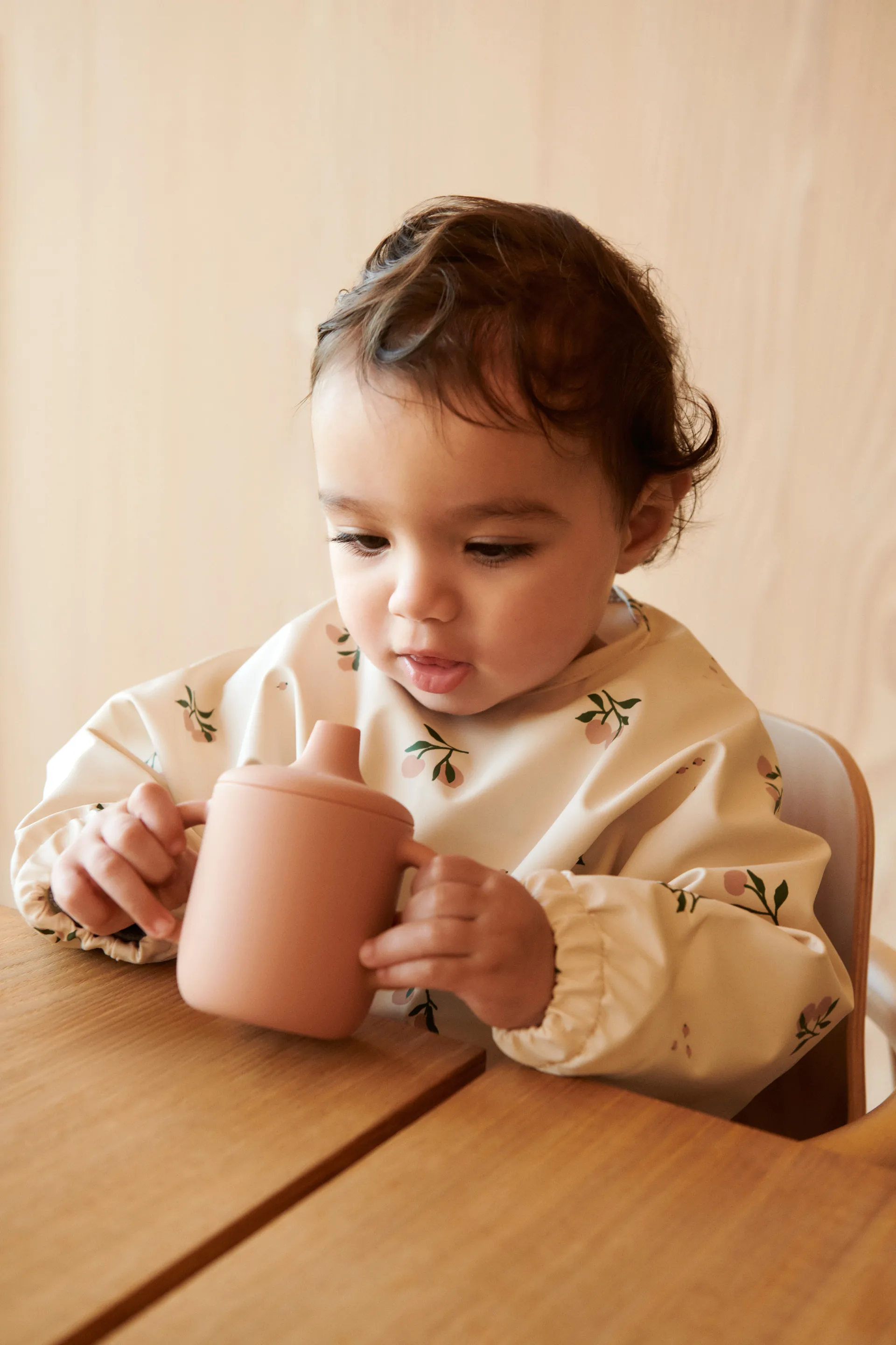 Merle Lätzchen mit Ärmel, Peach-Sea shell mix Liewood