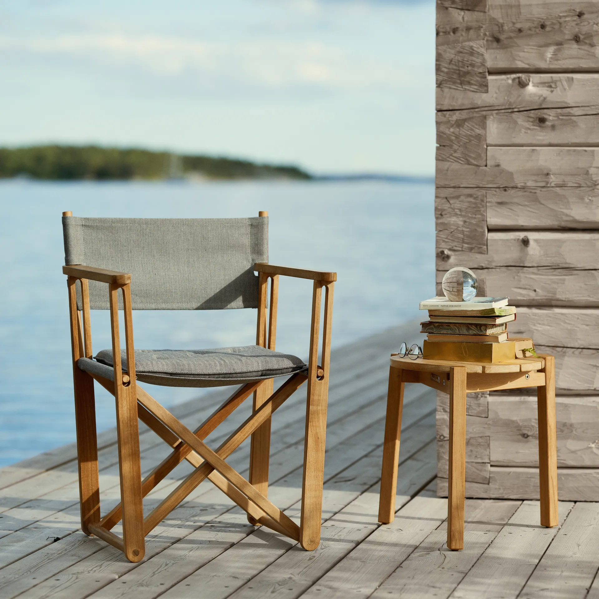 Kryss Lounge Sessel, Agora Nautic navy blue, teak Skargaarden