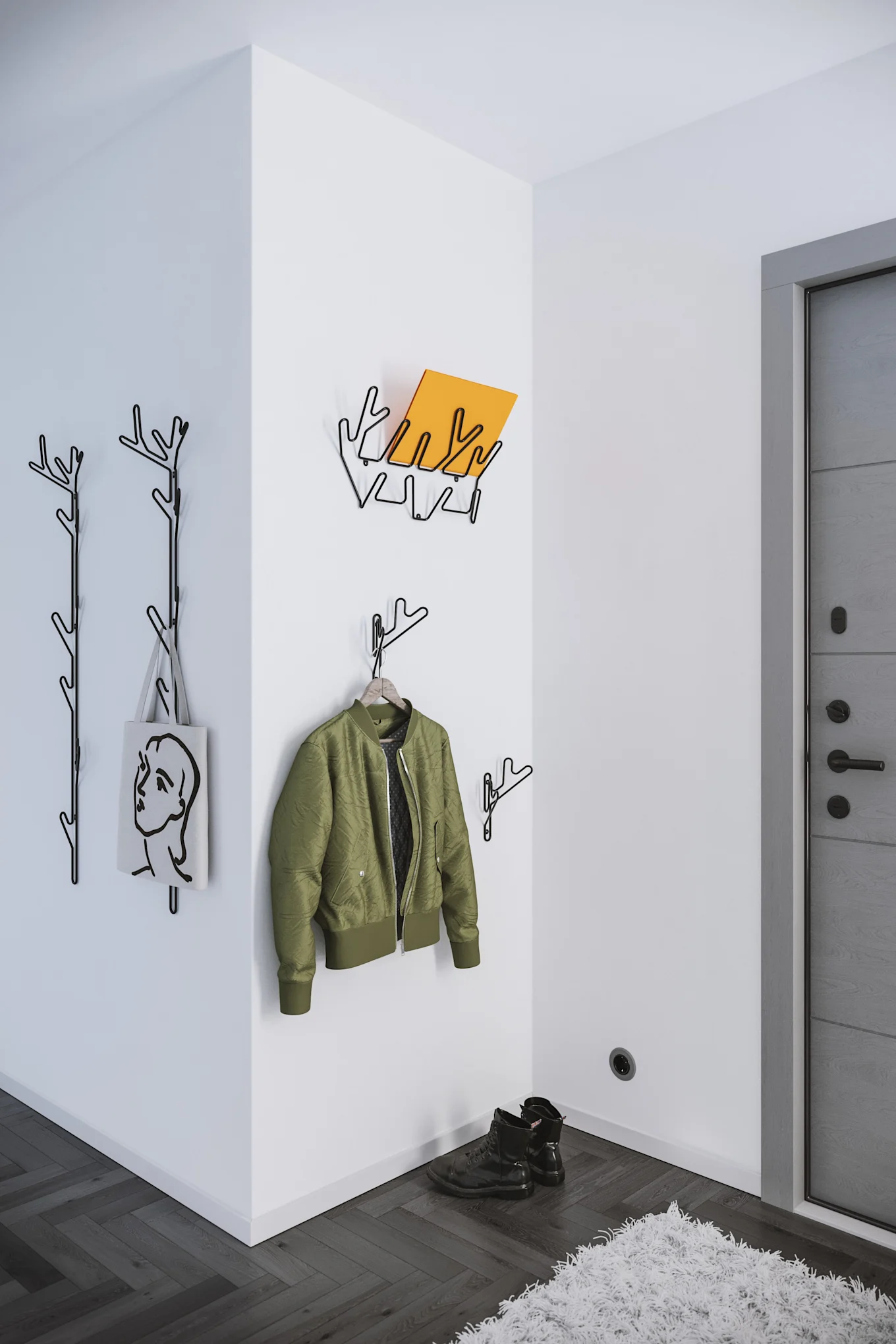 Die Branch Wandgarderobe von Maze mit einer grünen Jacke und einer gelben Mappe in einem offenen Flur.