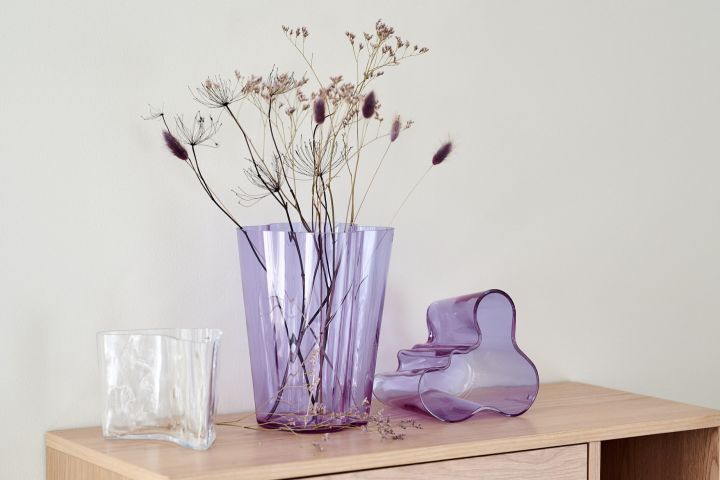 Alvar Aalto vases in amethyst with dried flowers, part of the anniversary collection from Iittala.