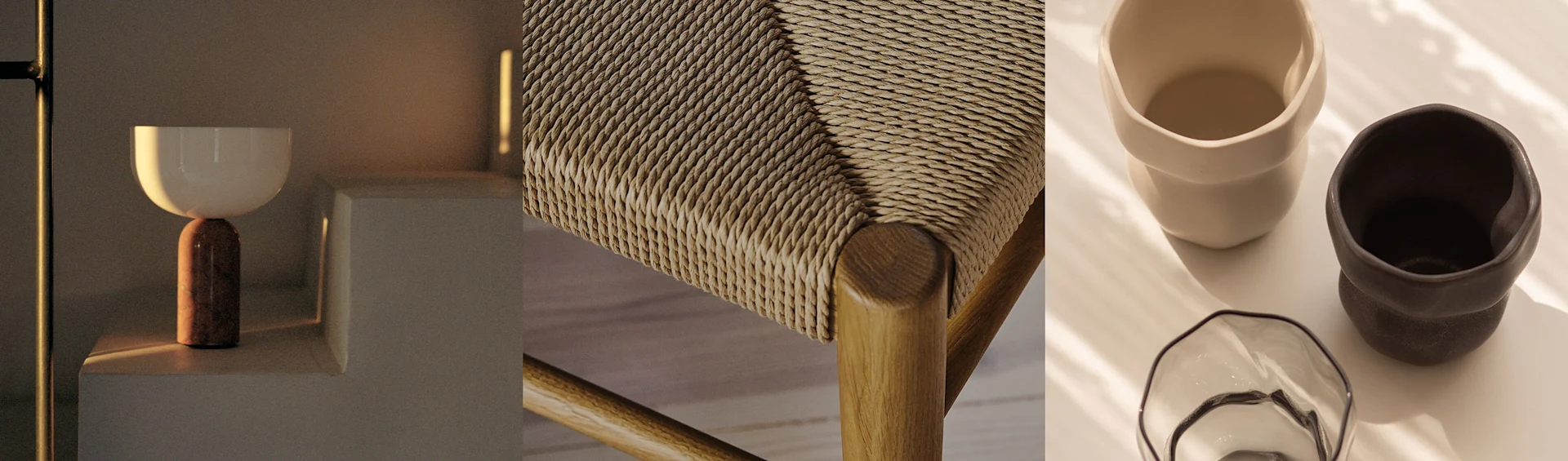 Eine moderne Lampe, ein geflochtener Stuhlsitz und zwei Keramiktassen mit einer Glasschale, alles in warmen Tönen.
