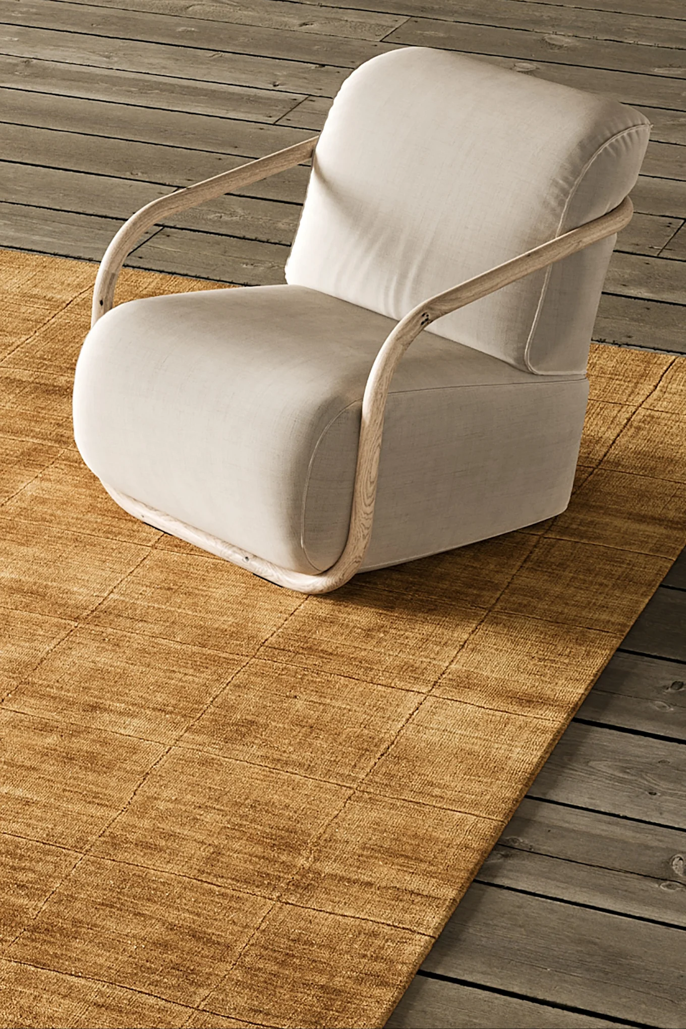 Hier abgebildet ist der Hunk-Sessel von Hem in einem dunklen Braunton, der die Farbtrends für Innenräume im Jahr 2026 widerspiegelt.