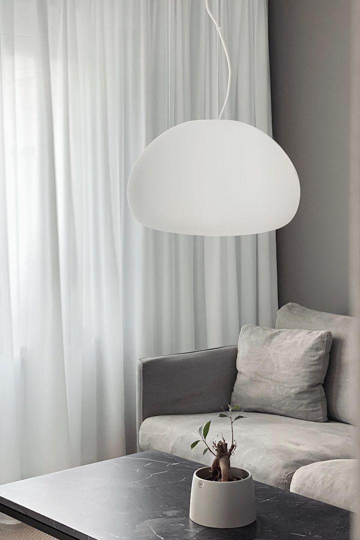 11 stylische Pendelleuchten für Ihr Wohlfühlzuhause - hier sehen Sie die Pendelleuchte Fluid von Muuto.